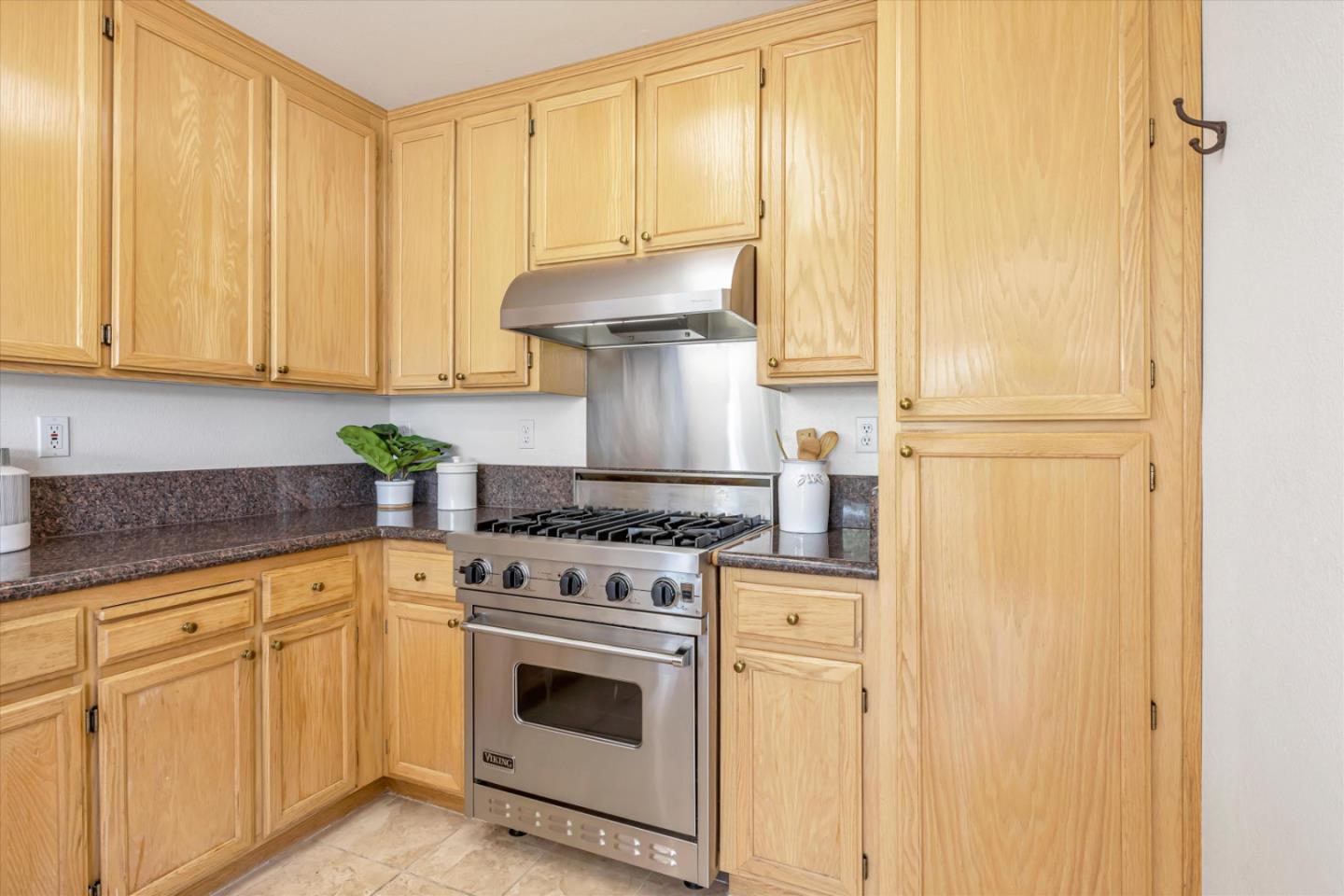 7863 Summerpointe Place Castro Valley, CA 94552 - Photo 12 of 43 a kitchen with white cabinets and white appliances