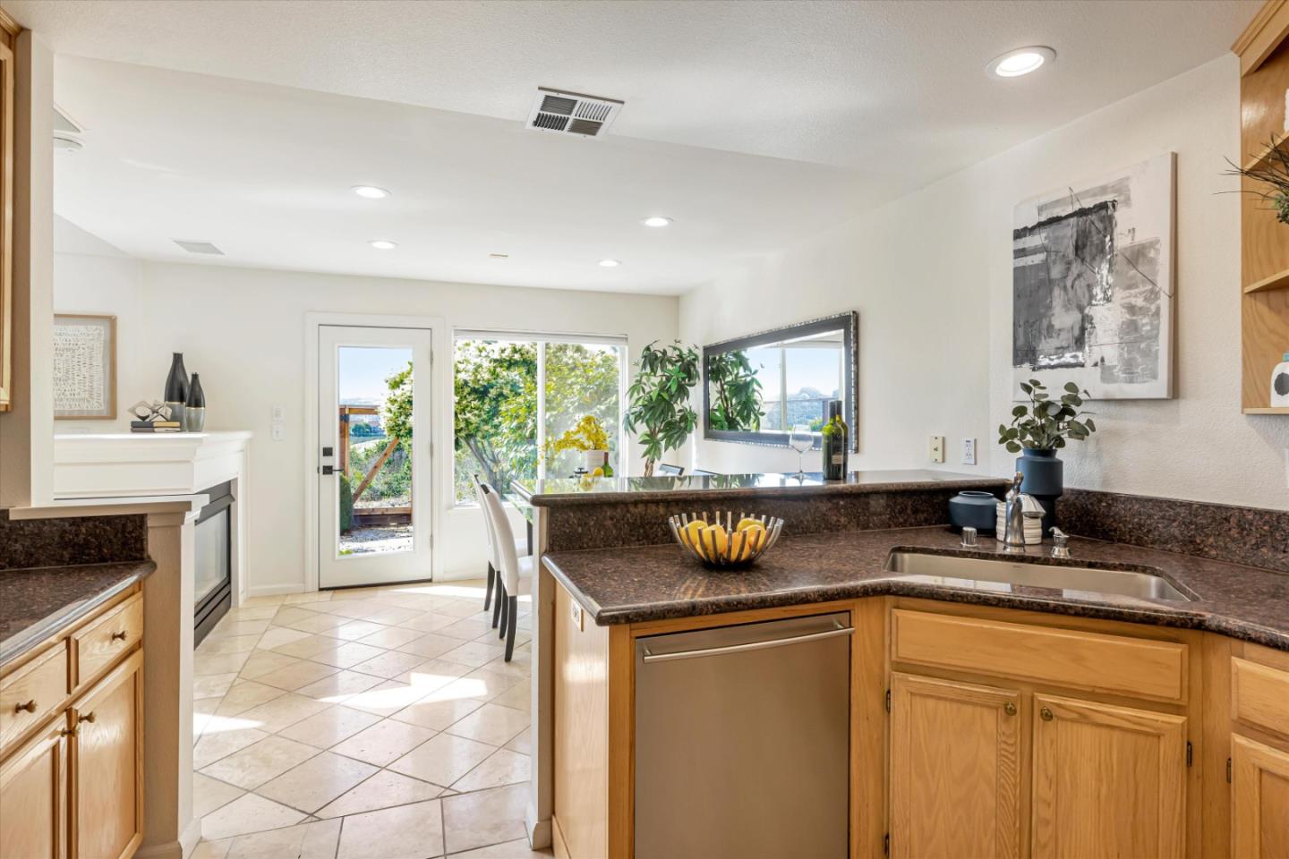 7863 Summerpointe Place Castro Valley, CA 94552 - Photo 14 of 43 a kitchen with a stove a sink a counter space and dining table