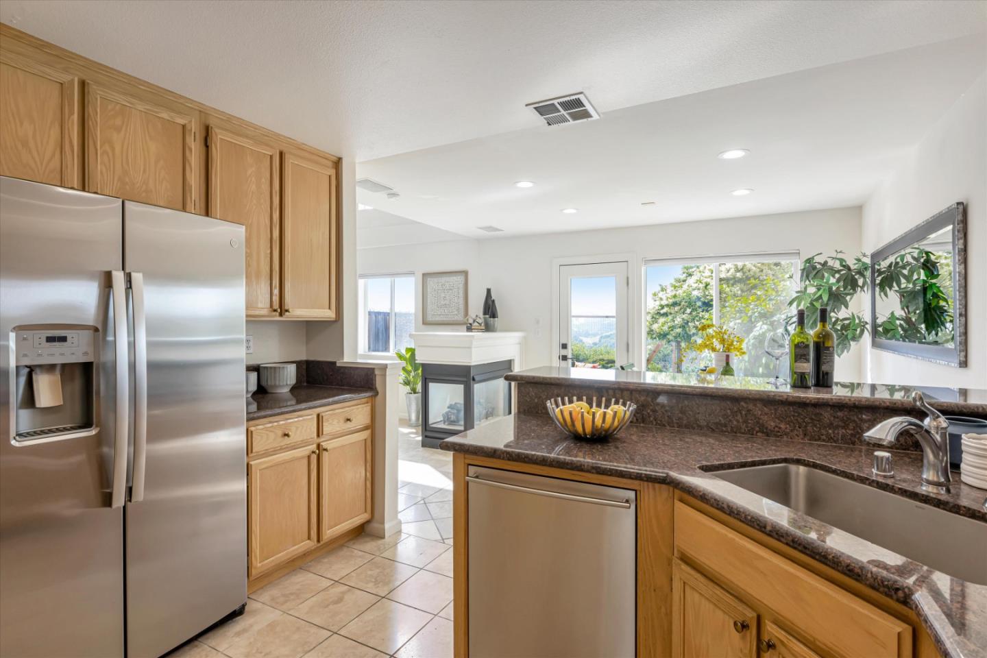 7863 Summerpointe Place Castro Valley, CA 94552 - Photo 15 of 43 a kitchen with a sink a refrigerator and window