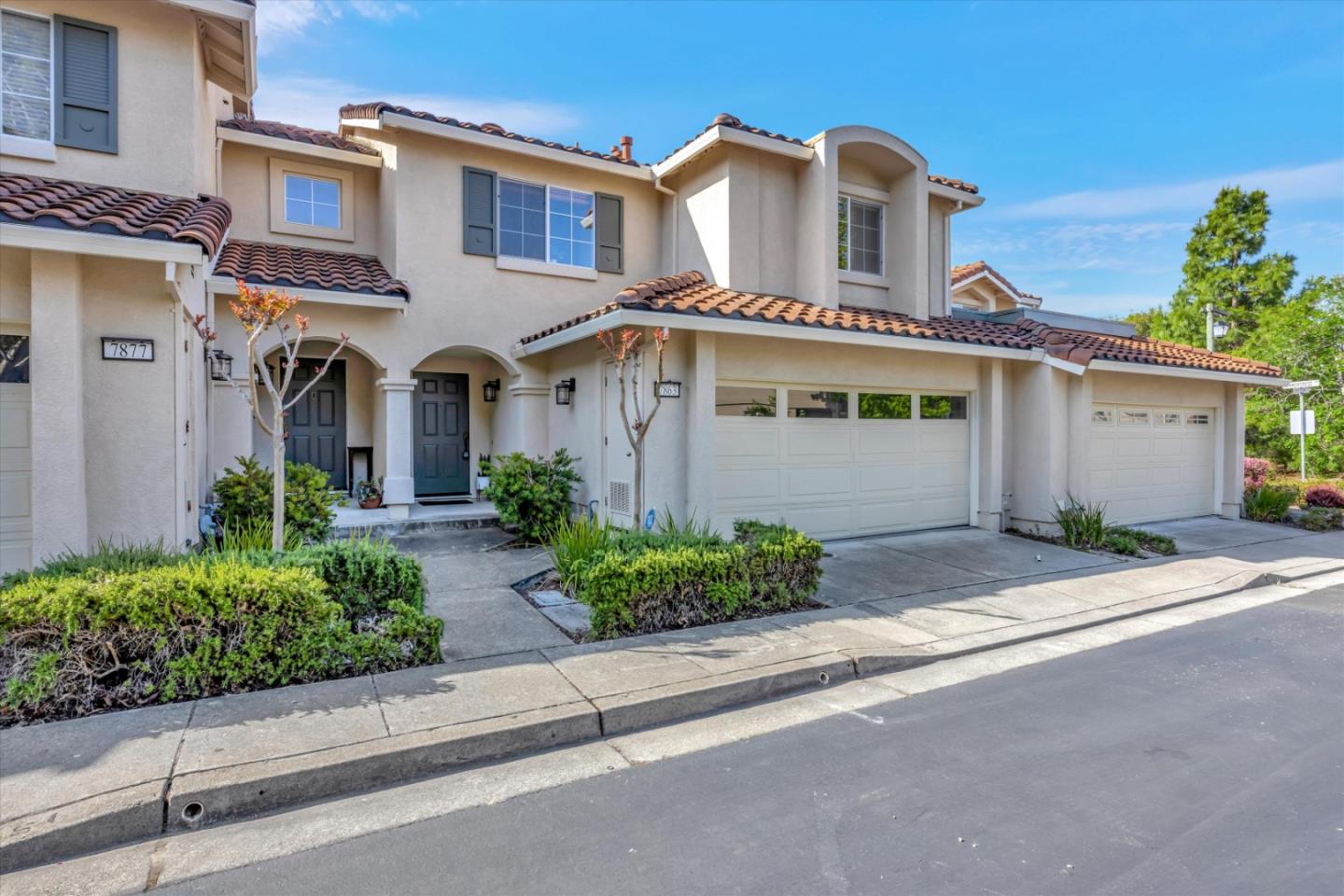 7863 Summerpointe Place Castro Valley, CA 94552 - Photo 2 of 43 a front view of a house with a yard and a garage
