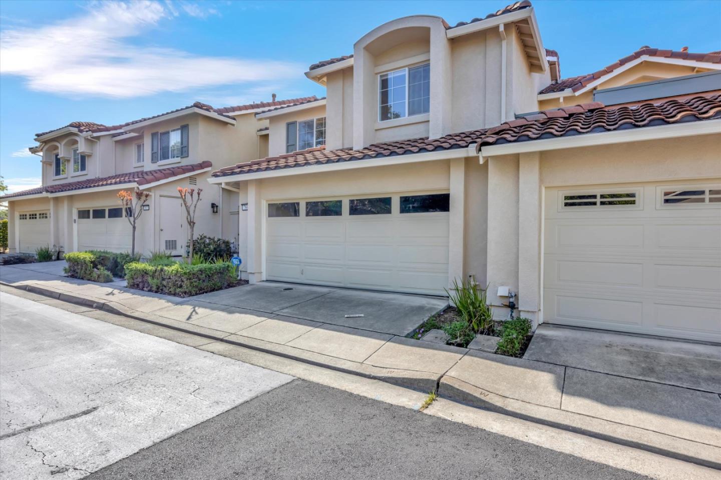 7863 Summerpointe Place Castro Valley, CA 94552 - Photo 3 of 43 a front view of a house with a yard and garage
