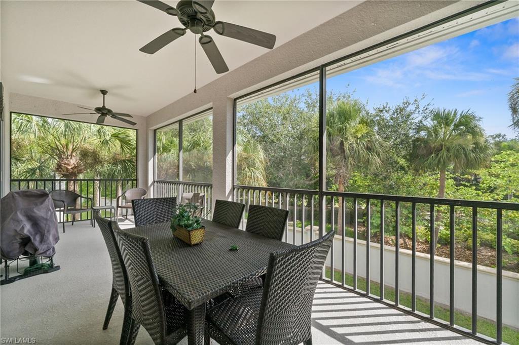 14562 Bellino Terrace, Unit 201 Bonita Springs, FL 34135 - Photo 28 of 46 a view of a dining room with furniture window and outside view