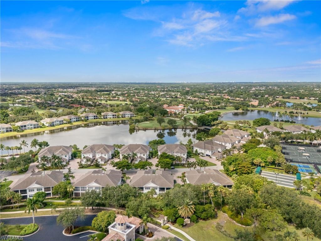 14562 Bellino Terrace, Unit 201 Bonita Springs, FL 34135 - Photo 36 of 46 an aerial view of residential building and lake