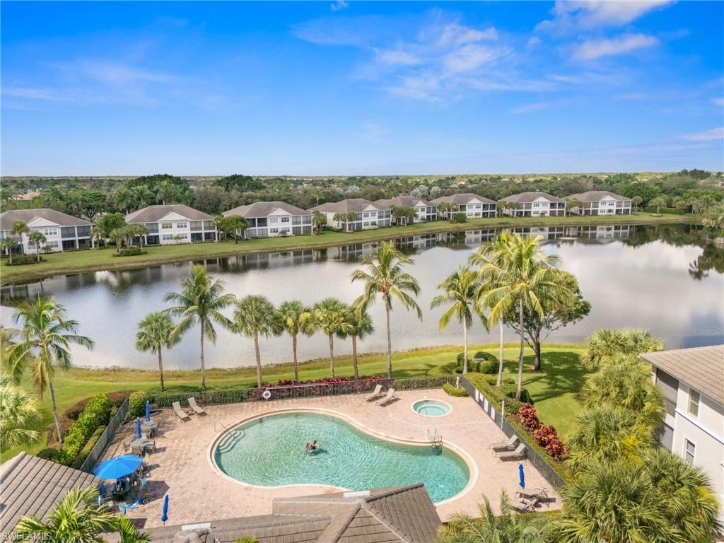 14562 Bellino Terrace, Unit 201 Bonita Springs, FL 34135 - Photo 38 of 46 an aerial view of residential houses with outdoor space and seating