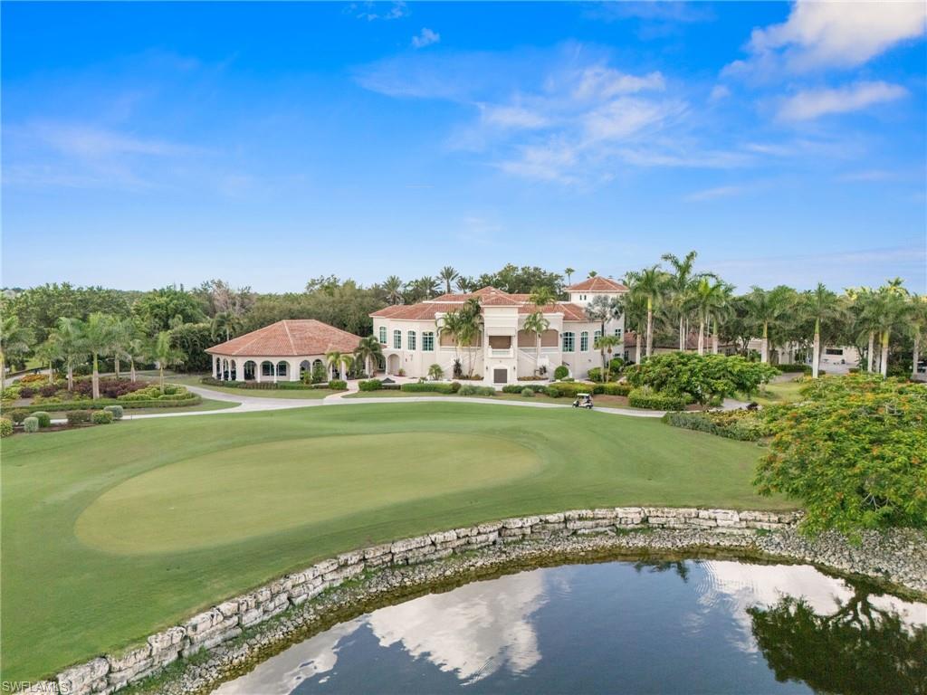 14562 Bellino Terrace, Unit 201 Bonita Springs, FL 34135 - Photo 39 of 46 a view of a garden with an ocean