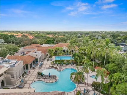 an aerial view of residential house with outdoor space and river