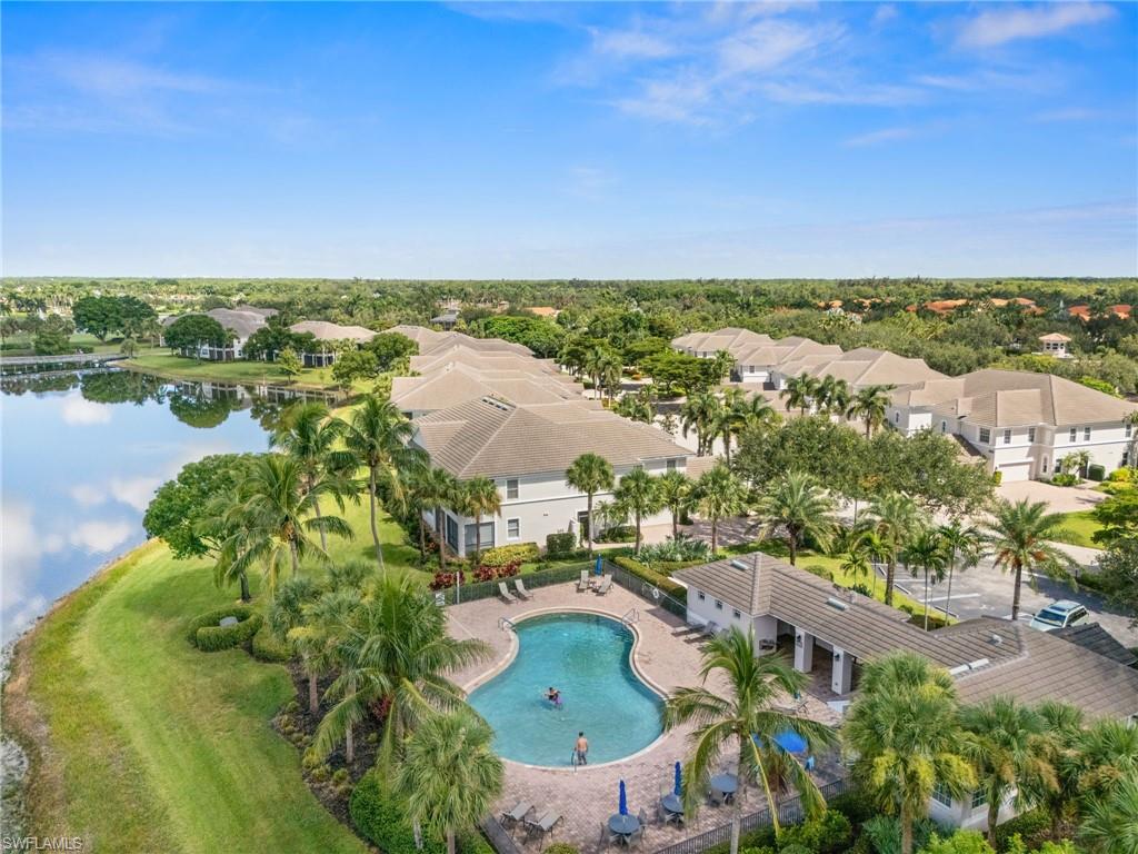 14562 Bellino Terrace, Unit 201 Bonita Springs, FL 34135 - Photo 43 of 46 a view of a lake with a city