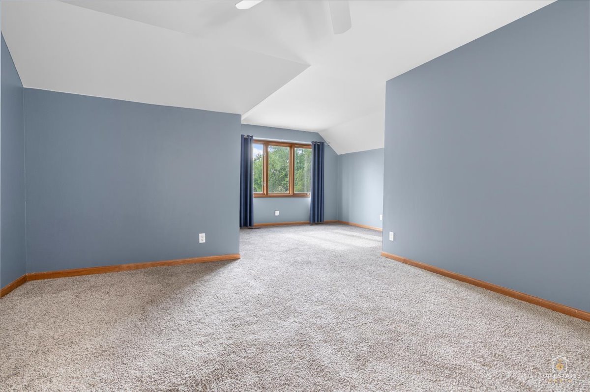 601 Ridgelawn Trail Batavia, IL 60510 - Photo 28 of 57 an empty room with windows