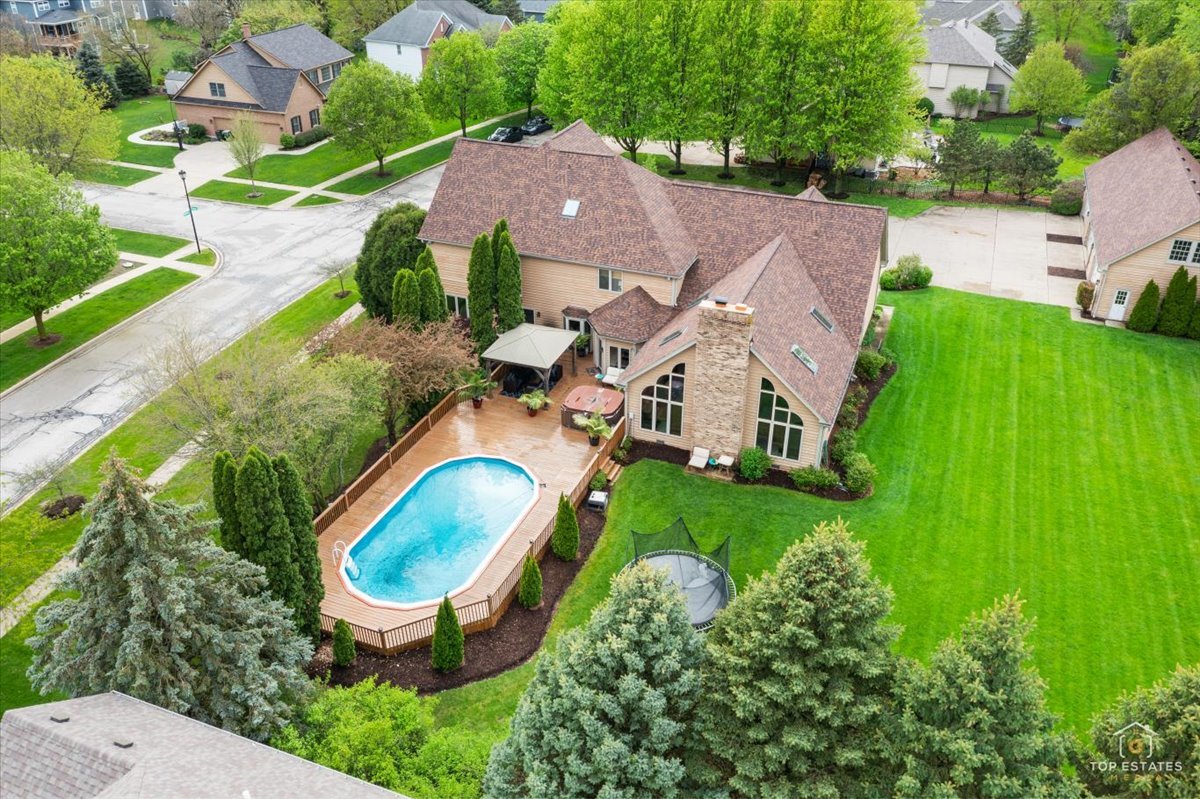 601 Ridgelawn Trail Batavia, IL 60510 - Photo 42 of 57 an aerial view of residential house with outdoor space and swimming pool