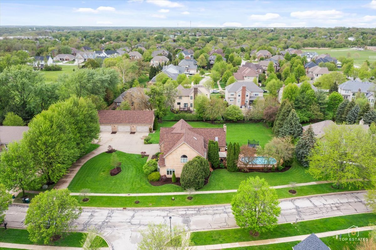 601 Ridgelawn Trail Batavia, IL 60510 - Photo 7 of 57 an aerial view of a house with lots of trees
