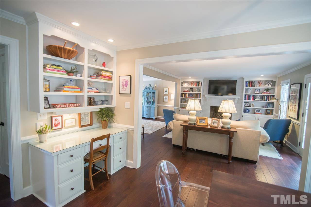 2209 Basil Drive Raleigh, NC 27612 - Photo 14 of 25 a view of a livingroom with workspace and a couch
