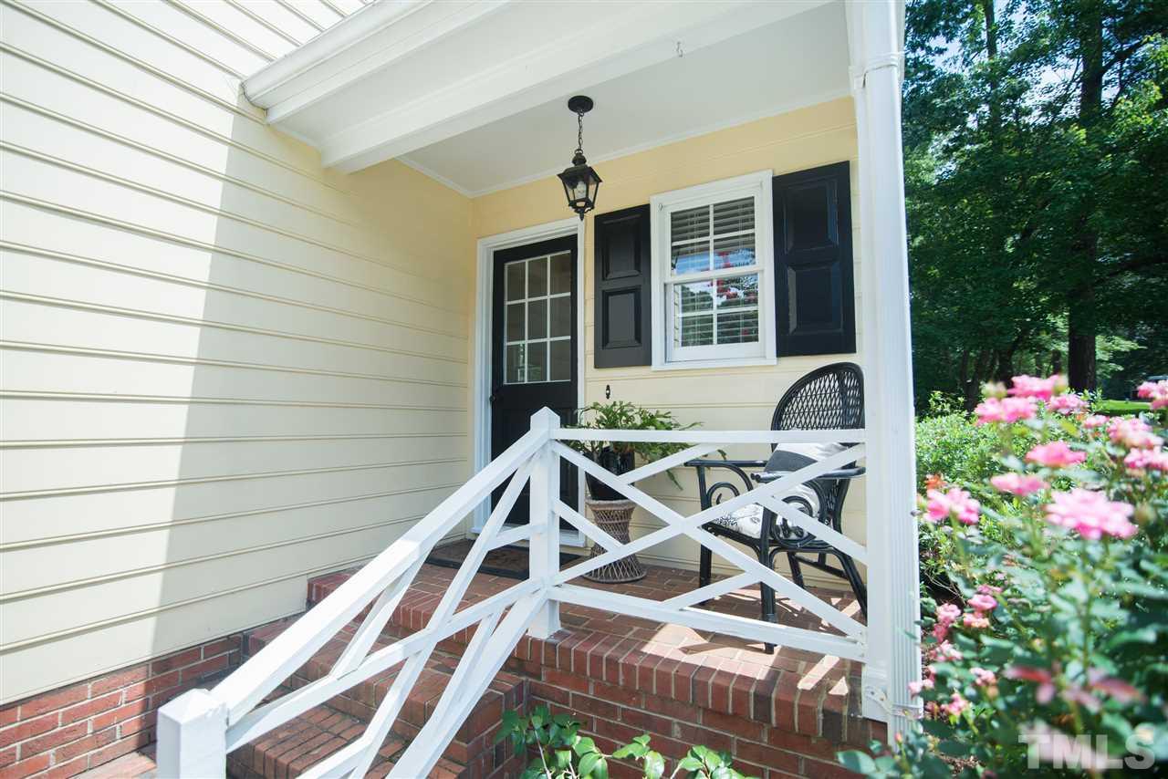 2209 Basil Drive Raleigh, NC 27612 - Photo 3 of 25 a front view of a house with a yard