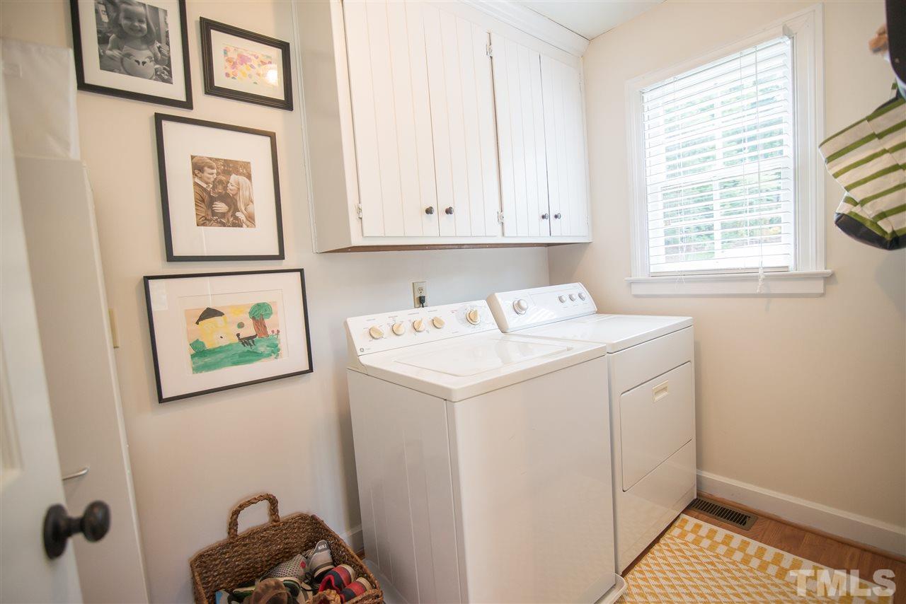 2209 Basil Drive Raleigh, NC 27612 - Photo 22 of 25 a utility room with dryer and washer