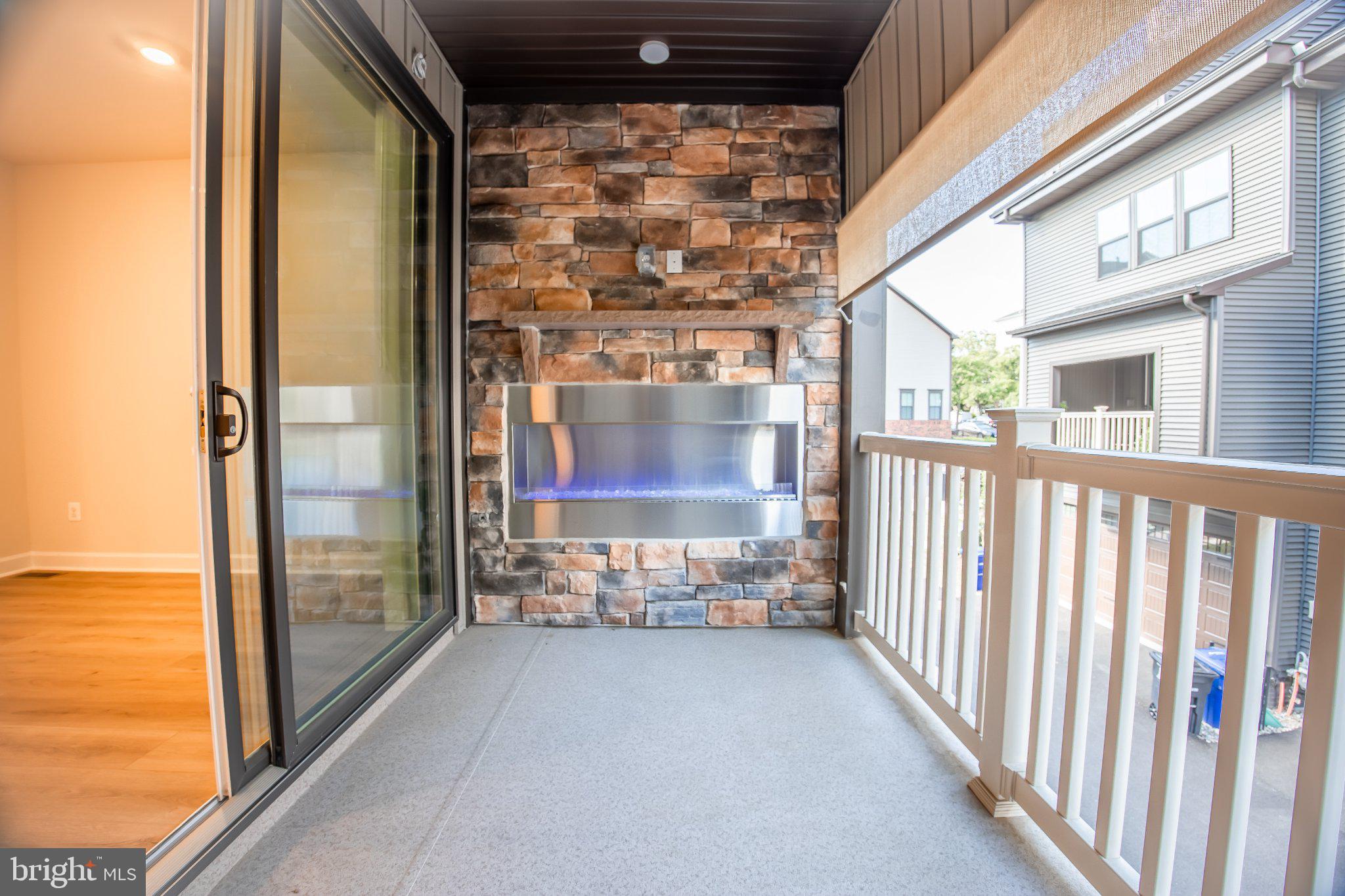 5313 8th Road South Arlington, VA 22204 - Photo 30 of 50 Stylish balcony with modern fireplace.