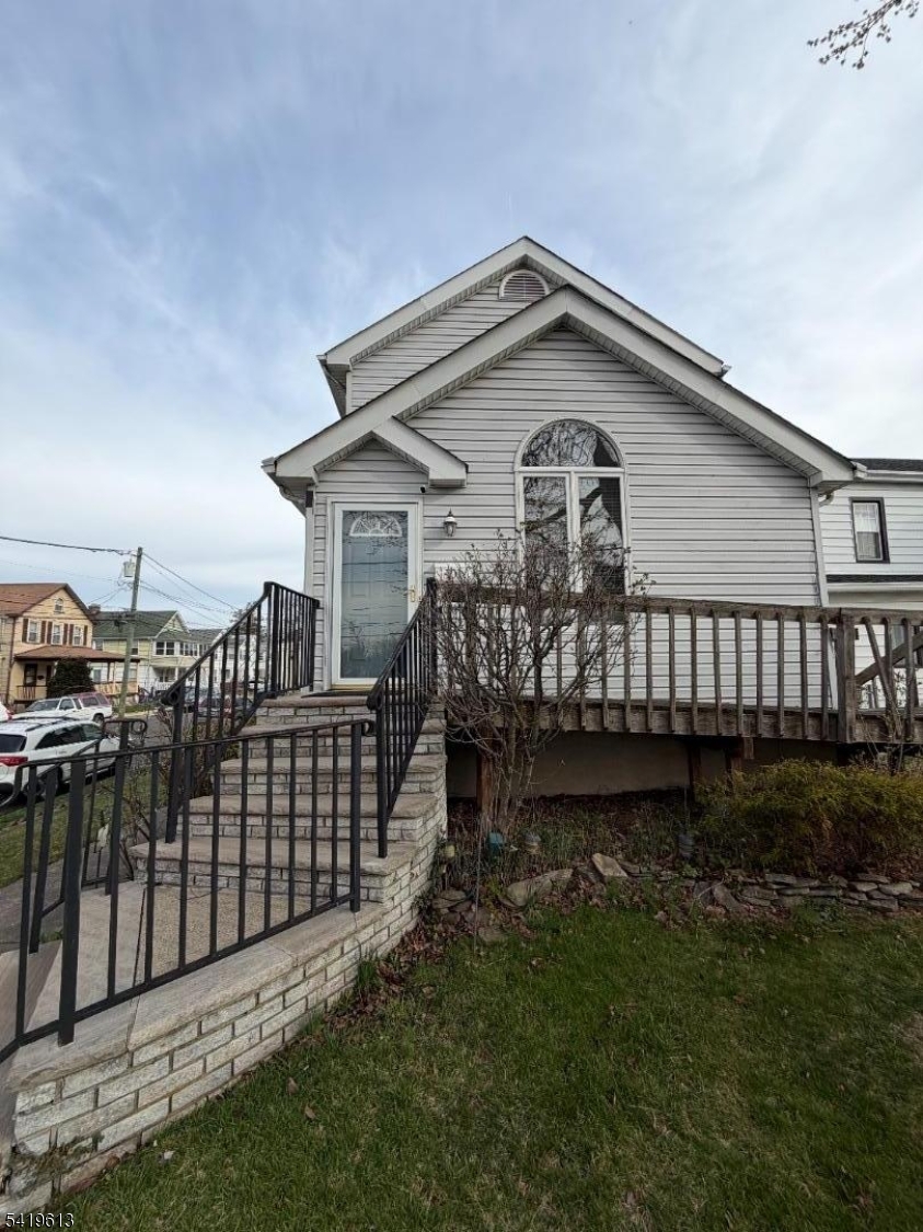 101 Liberty Street, Unit 2 Bloomfield, NJ 07003 - Photo 1 of 11 a view of a house with wooden fence