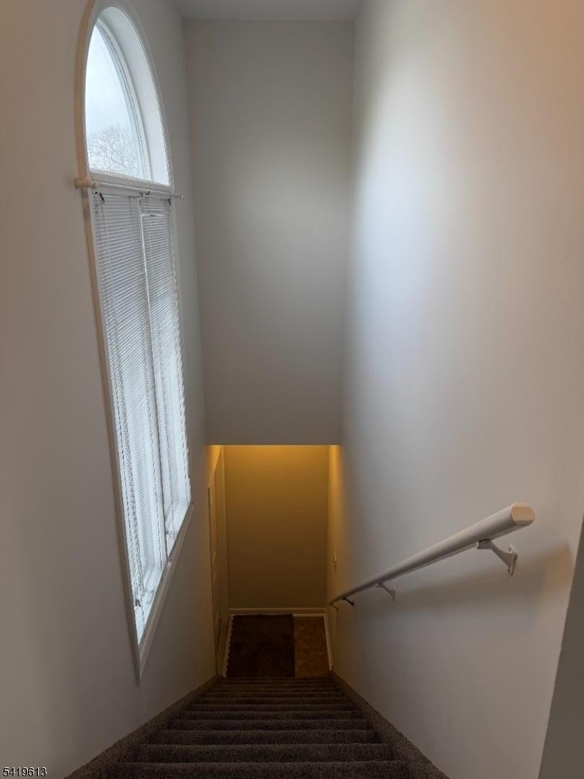 101 Liberty Street, Unit 2 Bloomfield, NJ 07003 - Photo 2 of 11 a bathroom with a sink and mirror