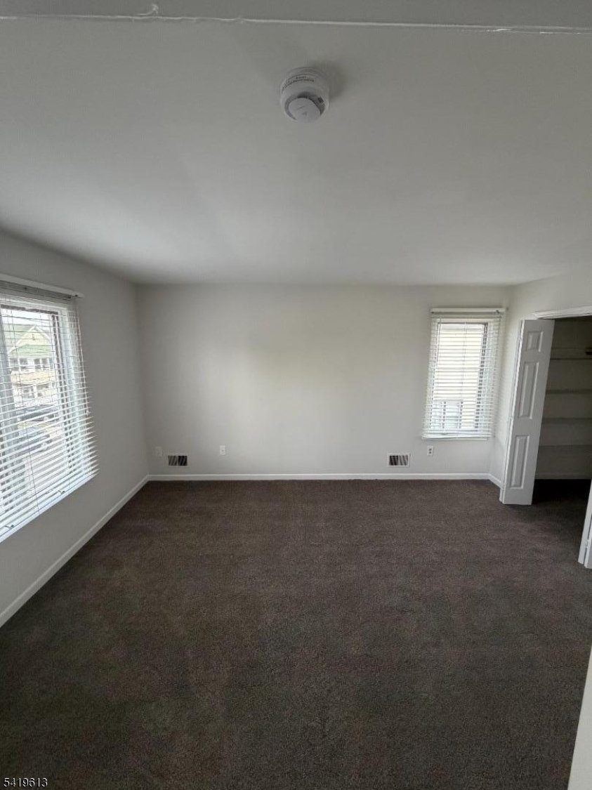 101 Liberty Street, Unit 2 Bloomfield, NJ 07003 - Photo 7 of 11 an empty room with a window