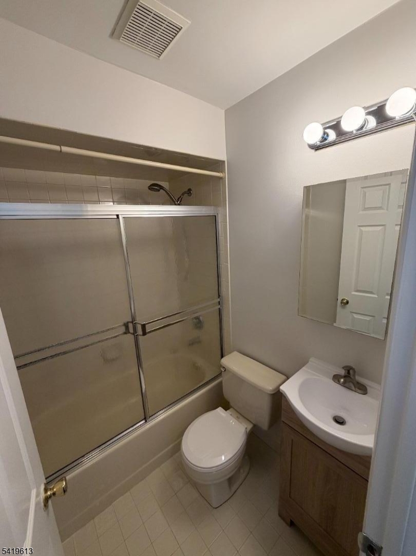 101 Liberty Street, Unit 2 Bloomfield, NJ 07003 - Photo 9 of 11 a bathroom with a toilet sink and tub