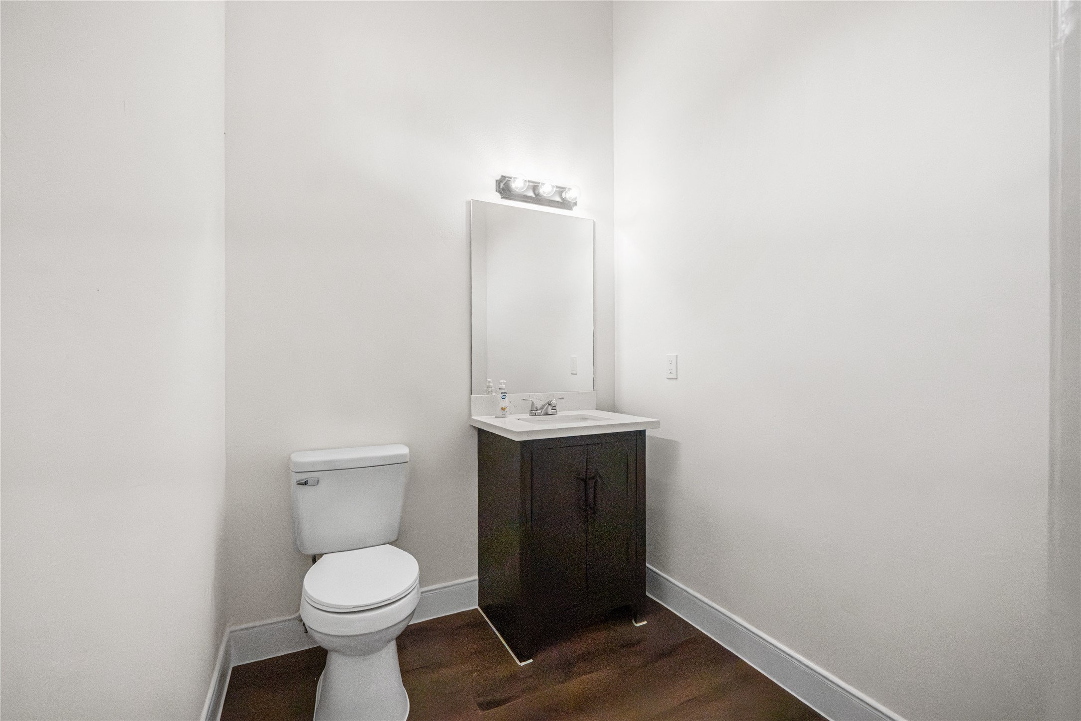 6413 North Ridgecrest Drive Hitchcock, TX 77563 - Photo 15 of 29 a bathroom with a sink and toilet