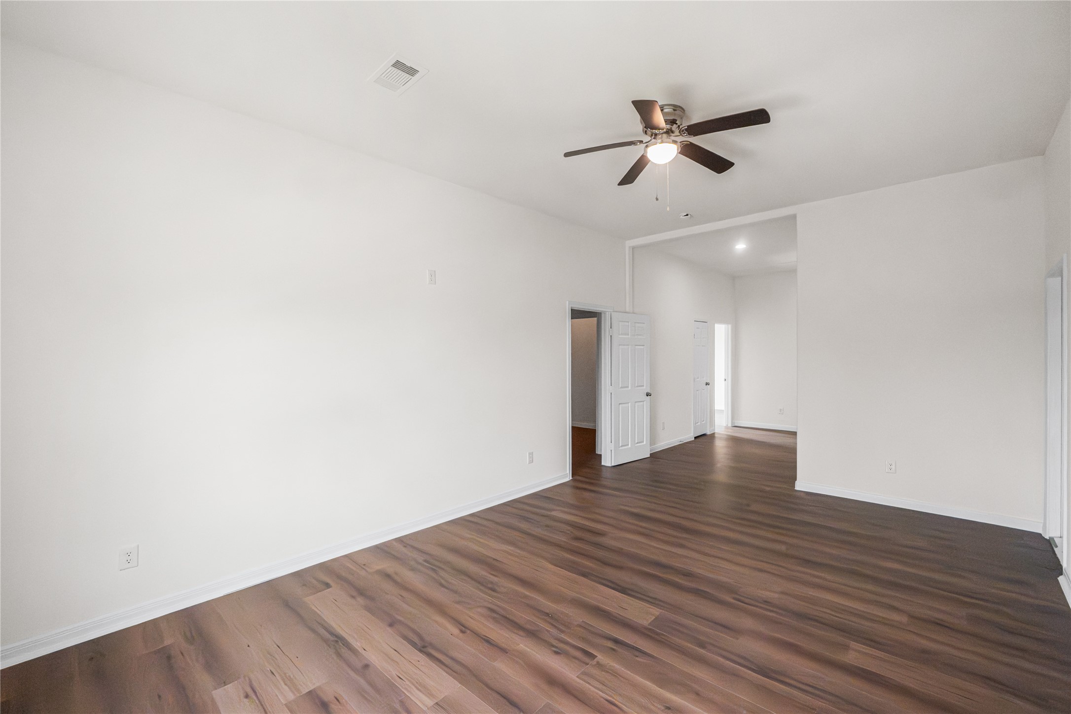 6413 North Ridgecrest Drive Hitchcock, TX 77563 - Photo 20 of 29 a view of empty room with wooden floor