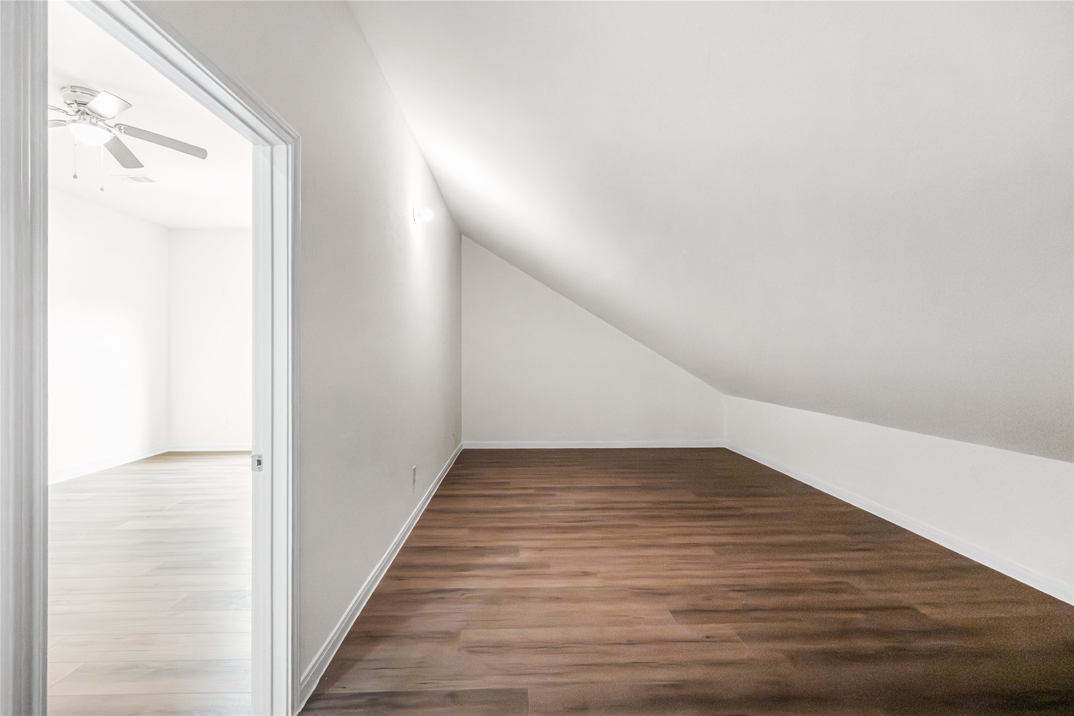 6413 North Ridgecrest Drive Hitchcock, TX 77563 - Photo 21 of 29 a view of a hallway with wooden floor