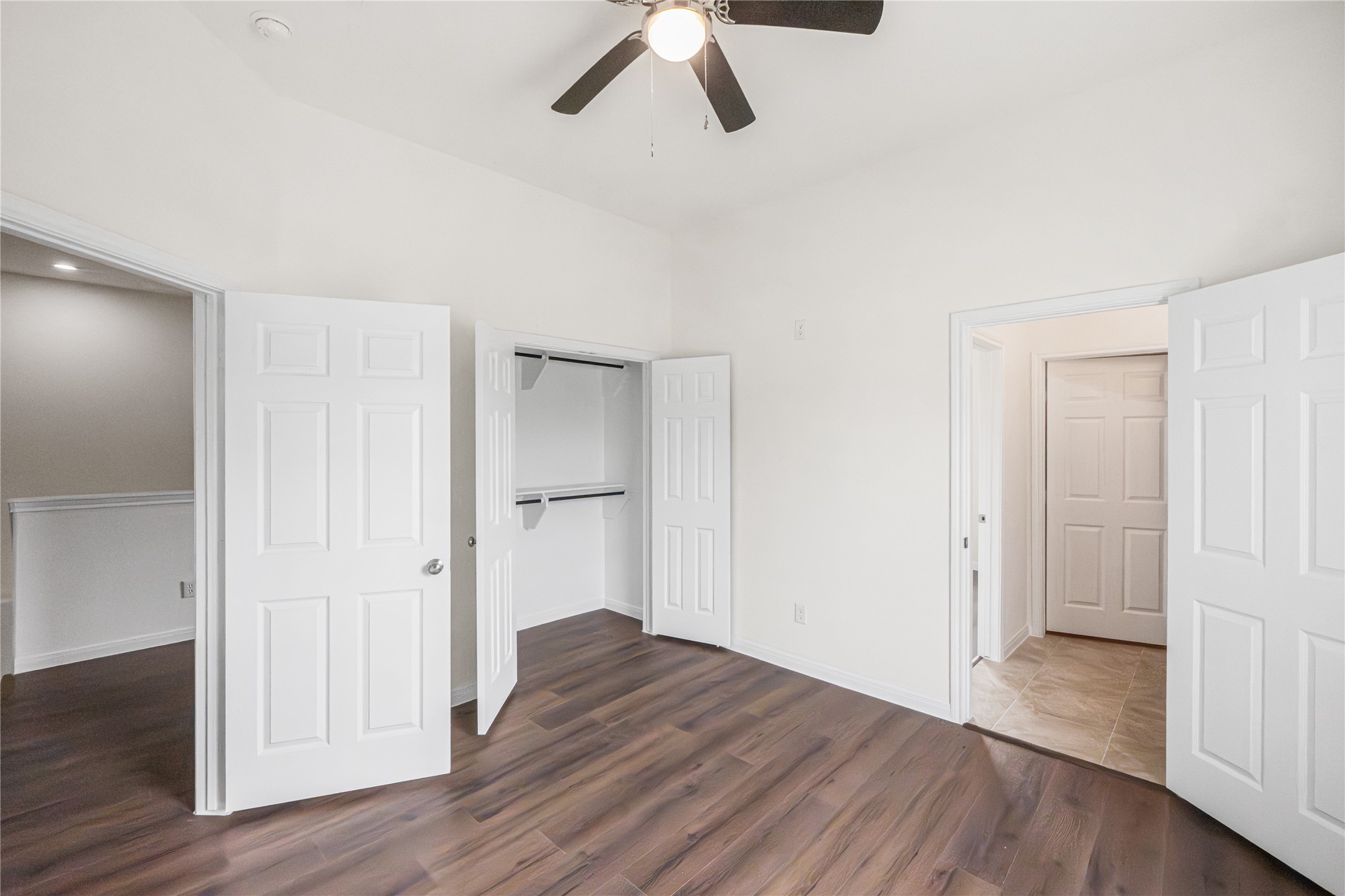 6413 North Ridgecrest Drive Hitchcock, TX 77563 - Photo 24 of 29 a view of empty room with wooden floor