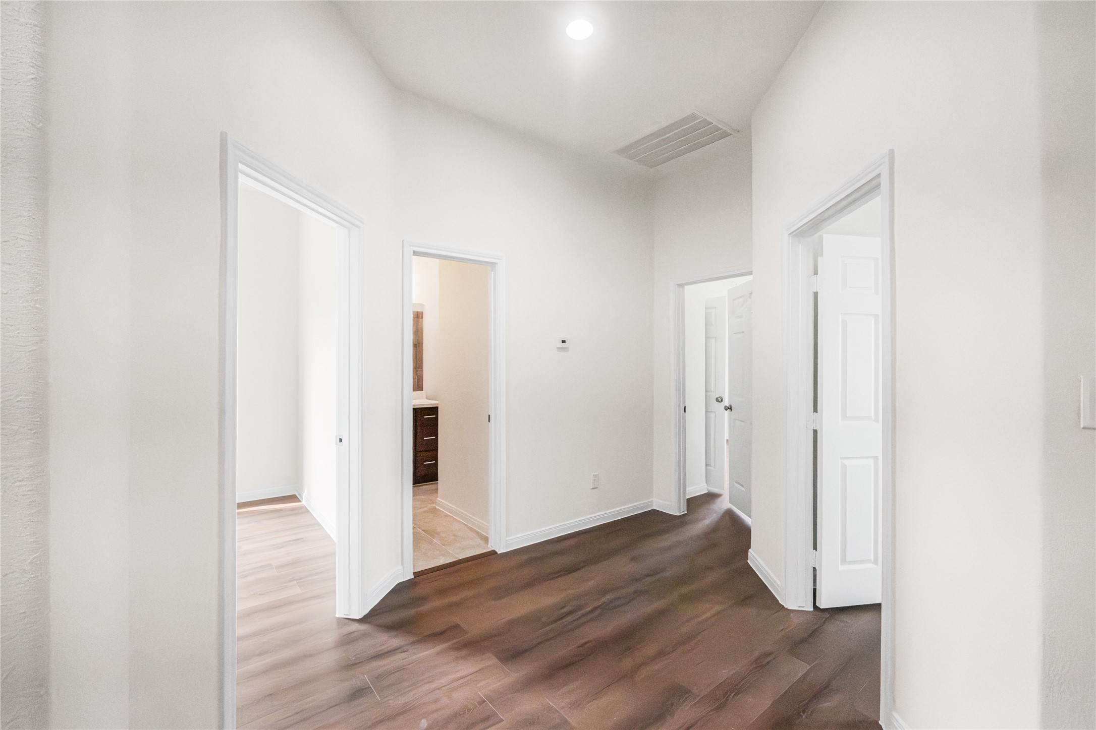 6413 North Ridgecrest Drive Hitchcock, TX 77563 - Photo 27 of 29 a view of hallway with wooden floor