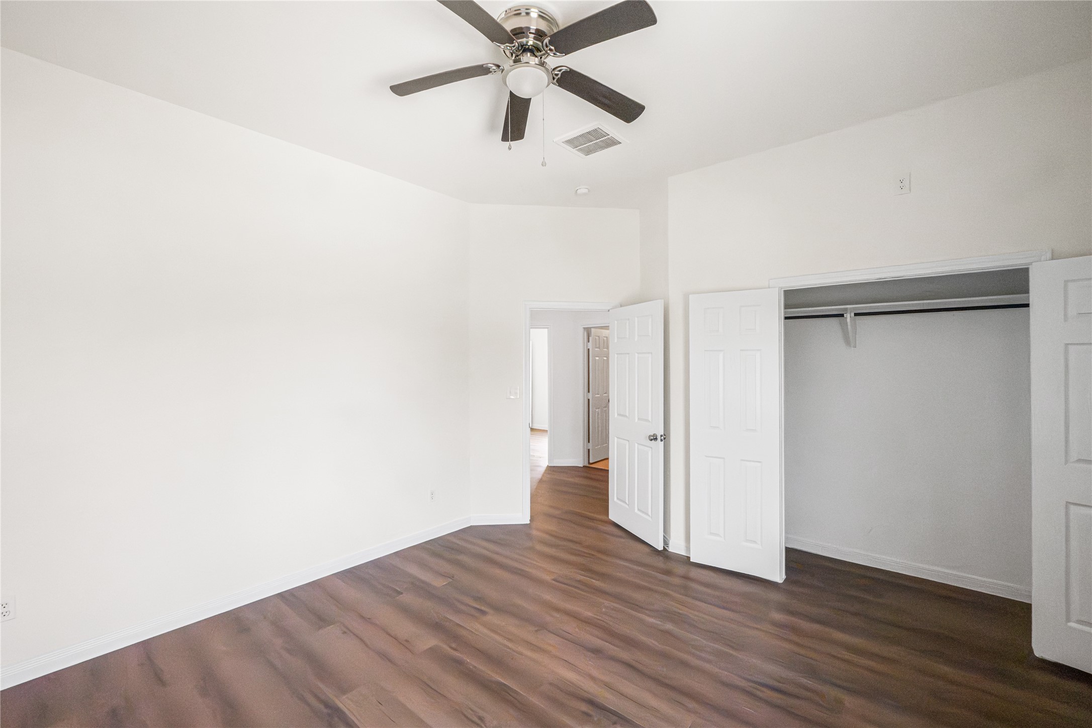 6413 North Ridgecrest Drive Hitchcock, TX 77563 - Photo 28 of 29 a view of an empty room with wooden floor
