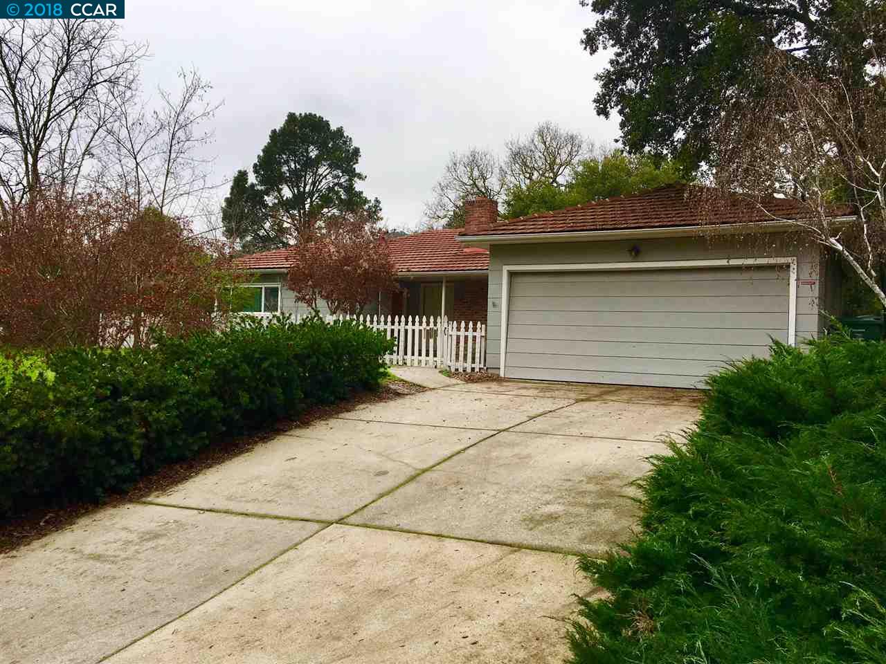 a house view with a outdoor space