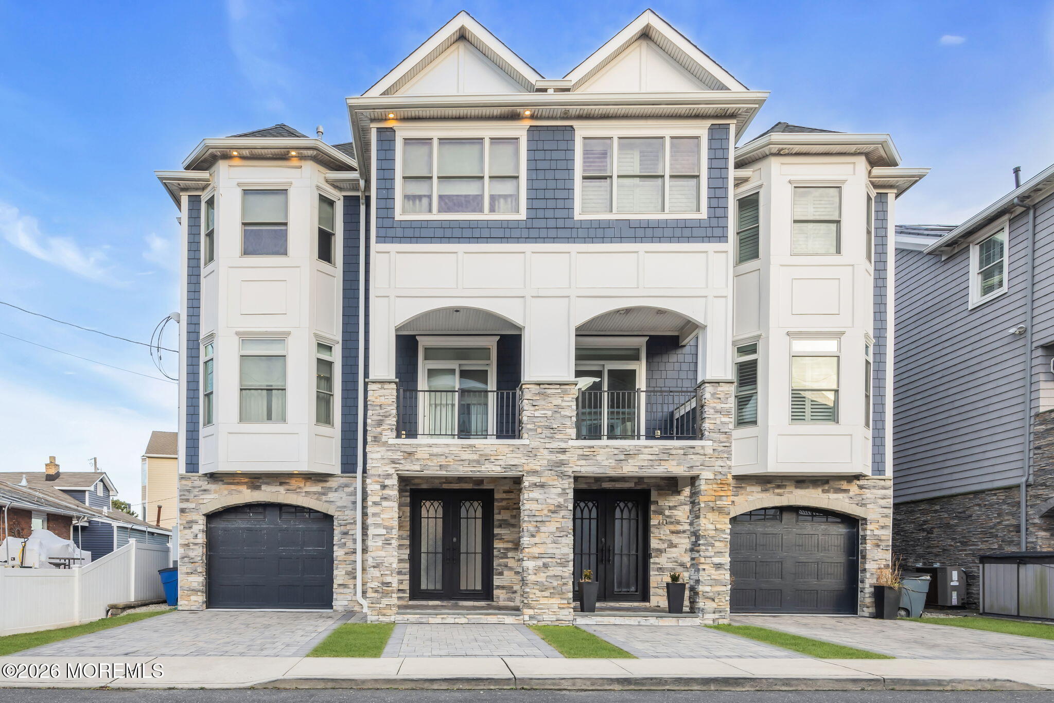 a front view of a brick building with many windows