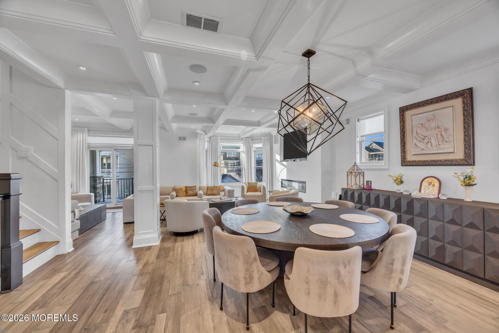 42 Marine Terrace Long Branch, NJ 07740 - Photo 11 of 36 a view of a dining room with furniture window and wooden floor