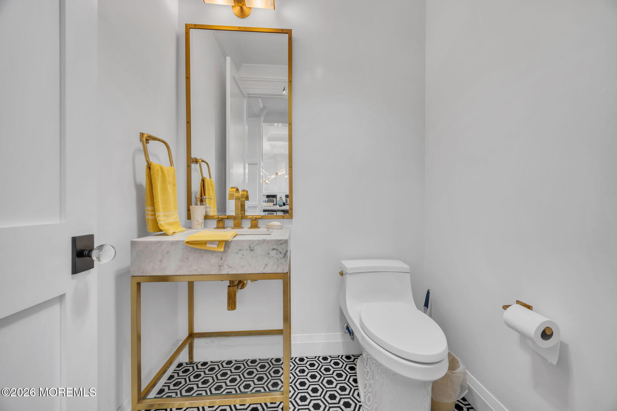 42 Marine Terrace Long Branch, NJ 07740 - Photo 15 of 36 a bathroom with a granite countertop toilet a sink and a mirror