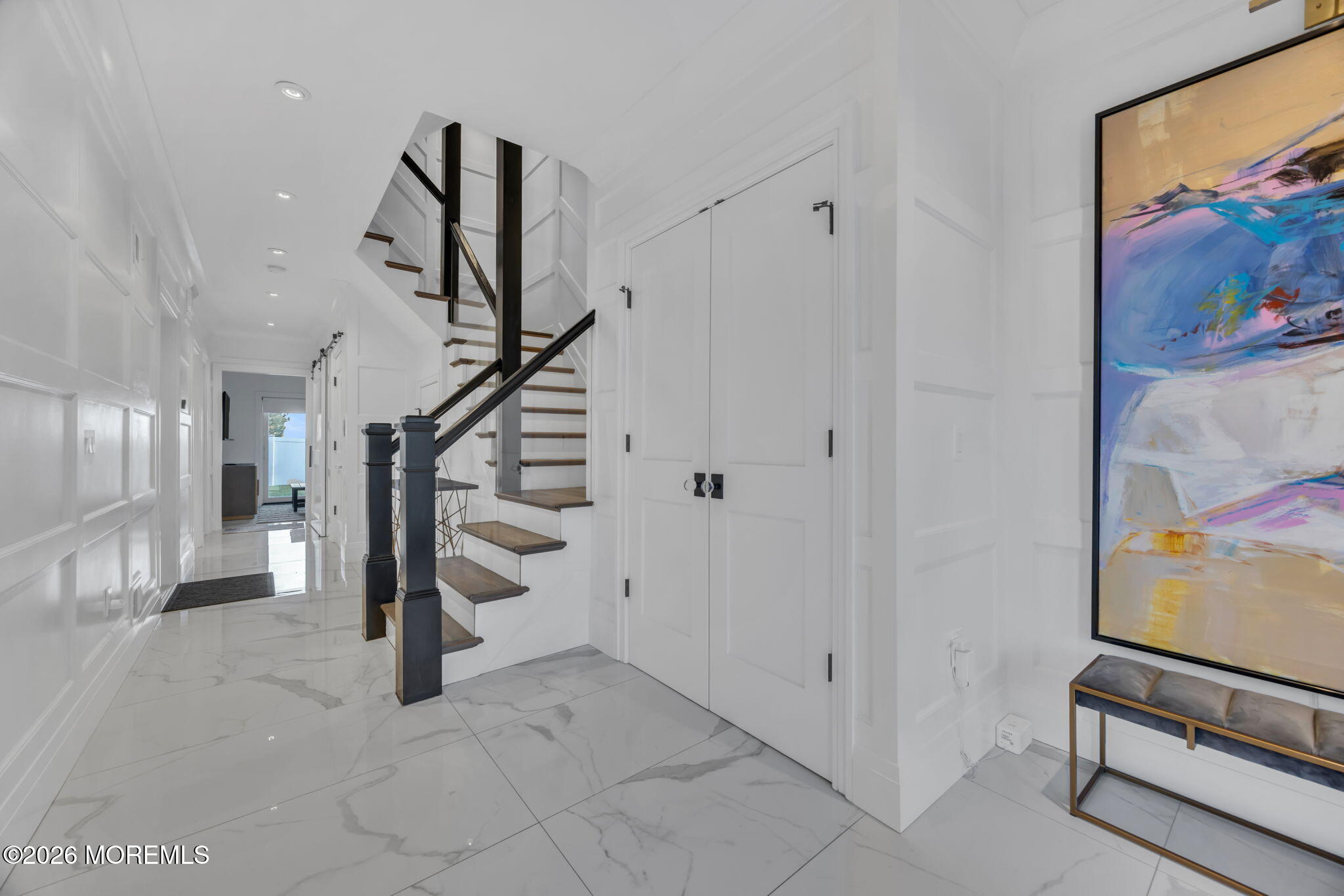 42 Marine Terrace Long Branch, NJ 07740 - Photo 16 of 36 a view of entryway with stairs and wooden floor