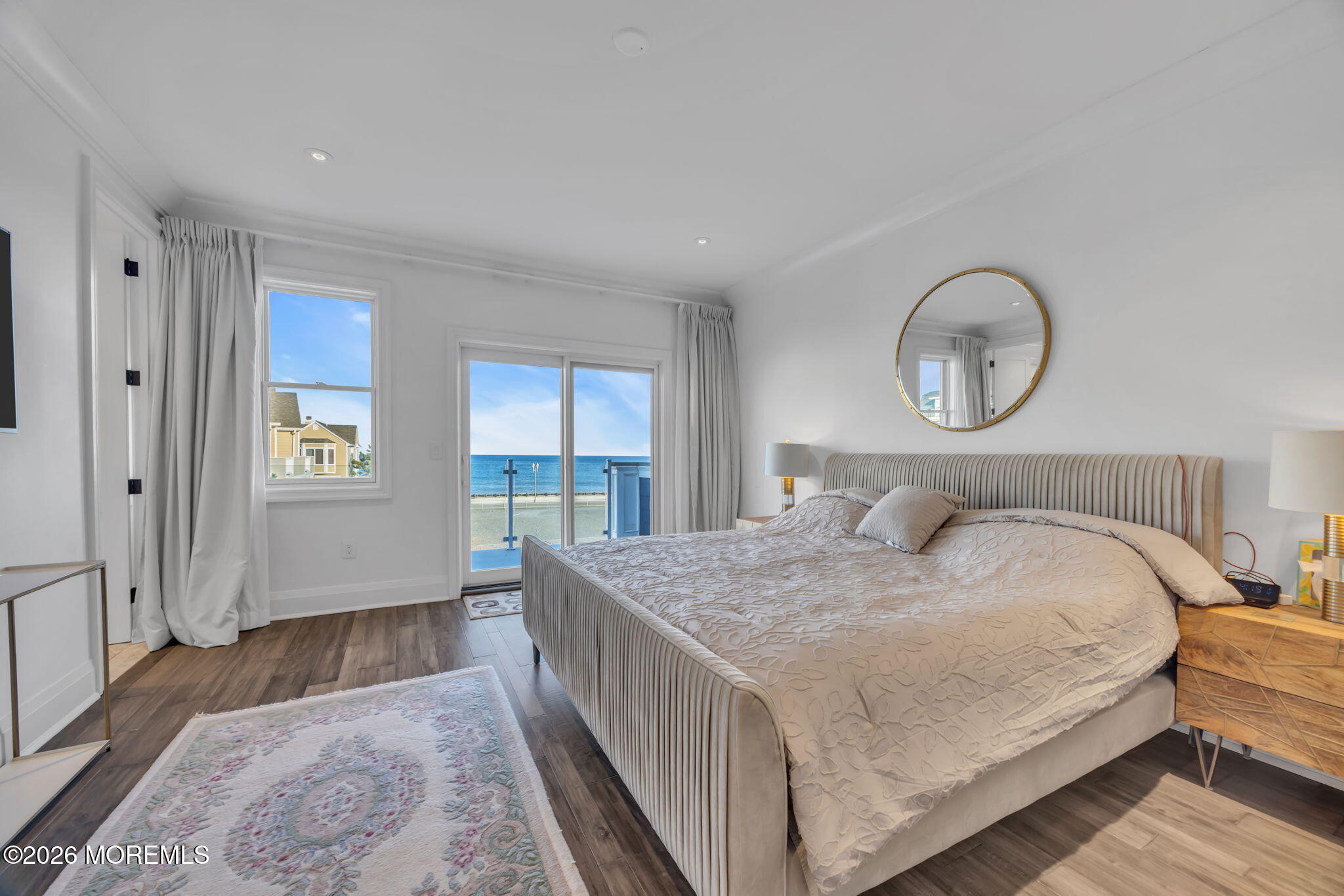 42 Marine Terrace Long Branch, NJ 07740 - Photo 17 of 36 a bedroom with a bed and a window