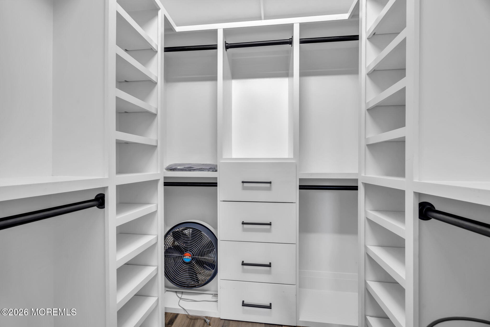 42 Marine Terrace Long Branch, NJ 07740 - Photo 19 of 36 a view of walk in closet with empty racks