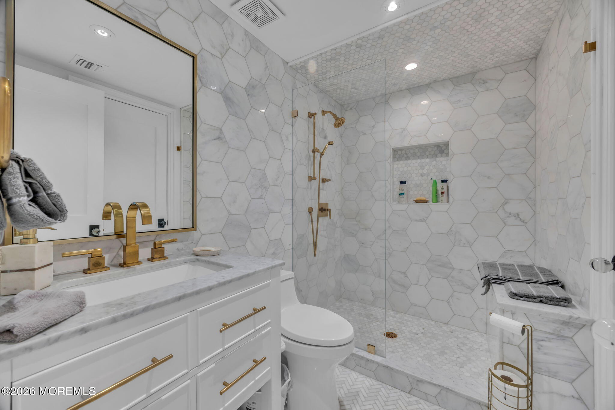 42 Marine Terrace Long Branch, NJ 07740 - Photo 23 of 36 a bathroom with a sink toilet and shower