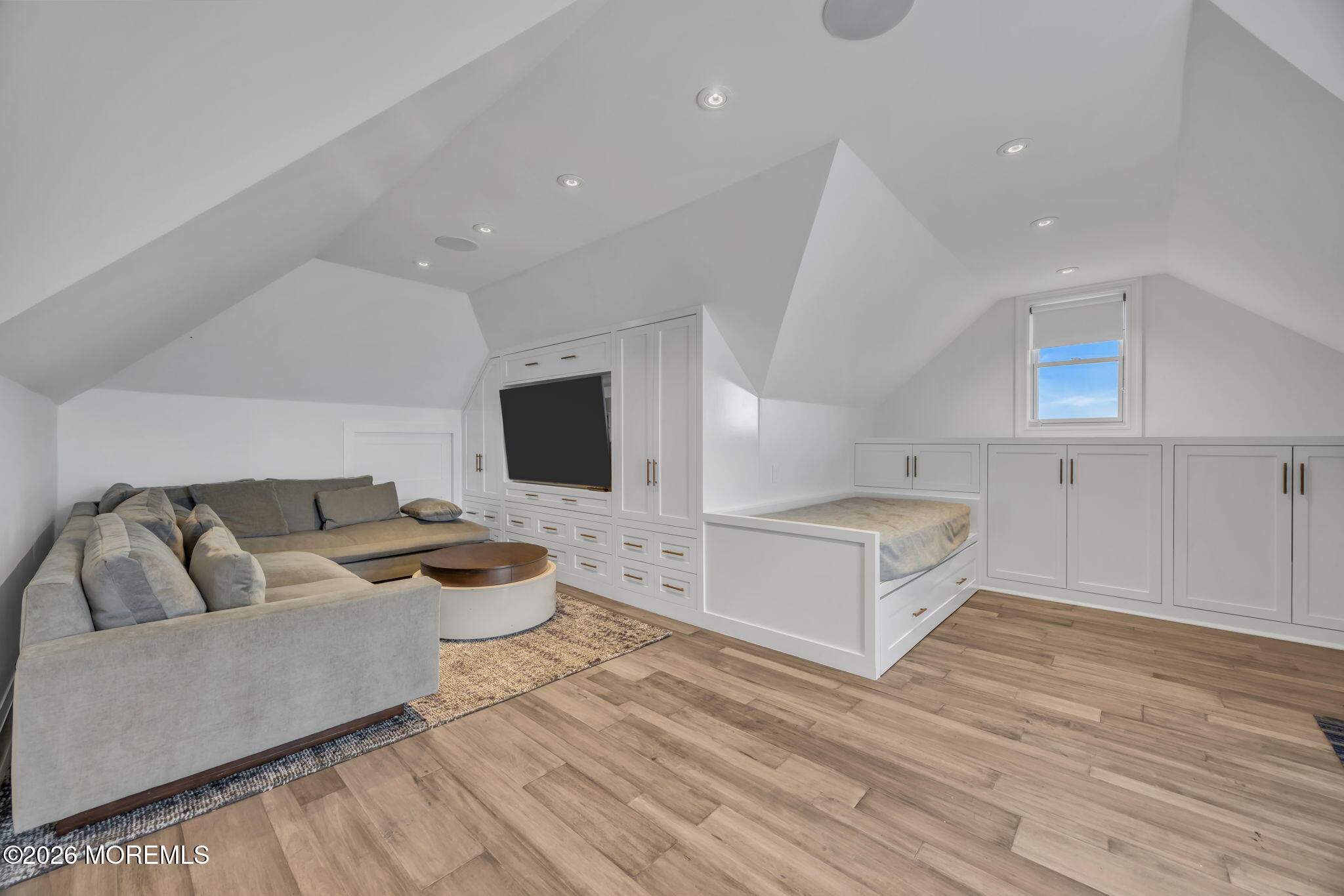 42 Marine Terrace Long Branch, NJ 07740 - Photo 28 of 36 a living room with furniture and a flat screen tv