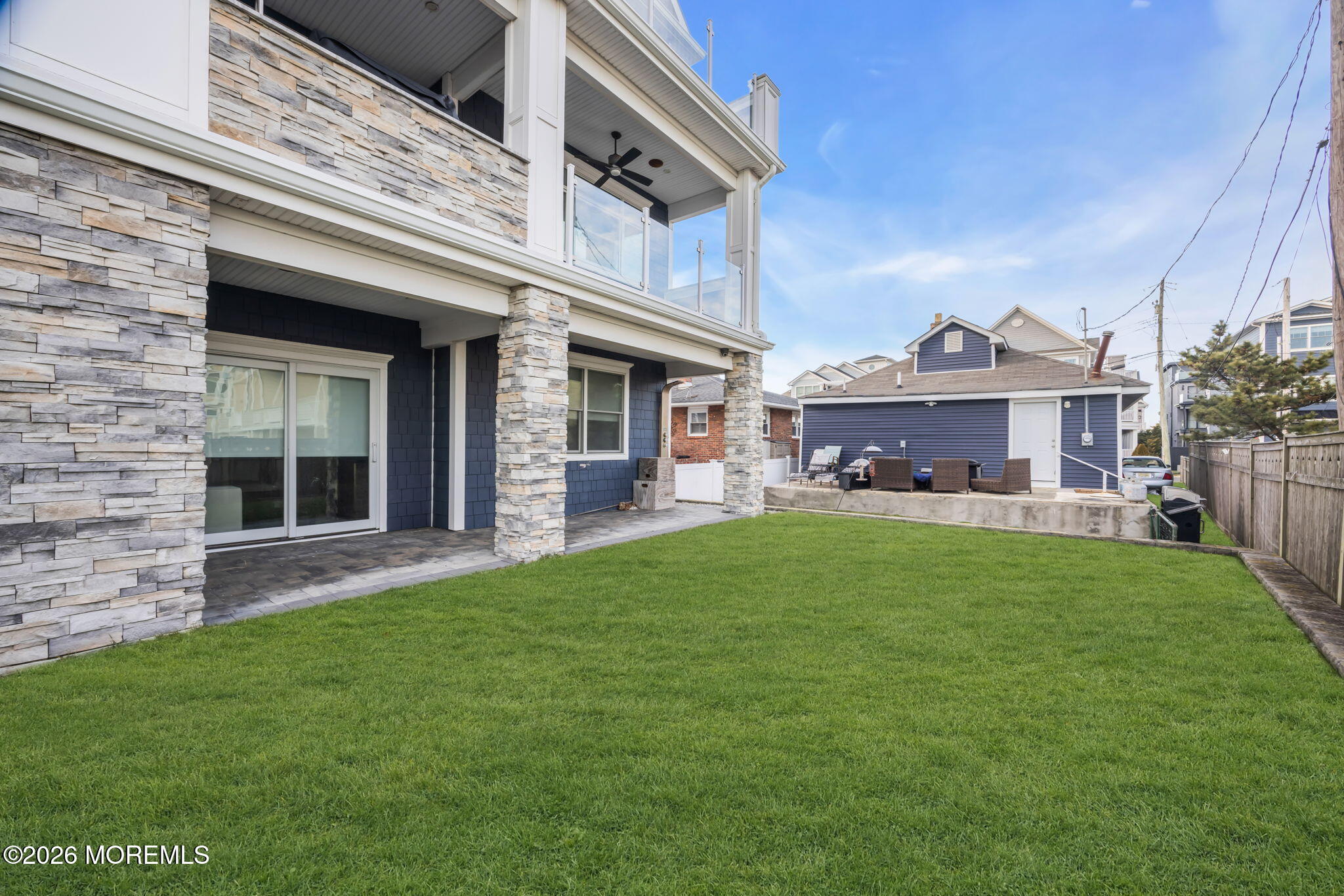 42 Marine Terrace Long Branch, NJ 07740 - Photo 35 of 36 a view of a big yard next to a building