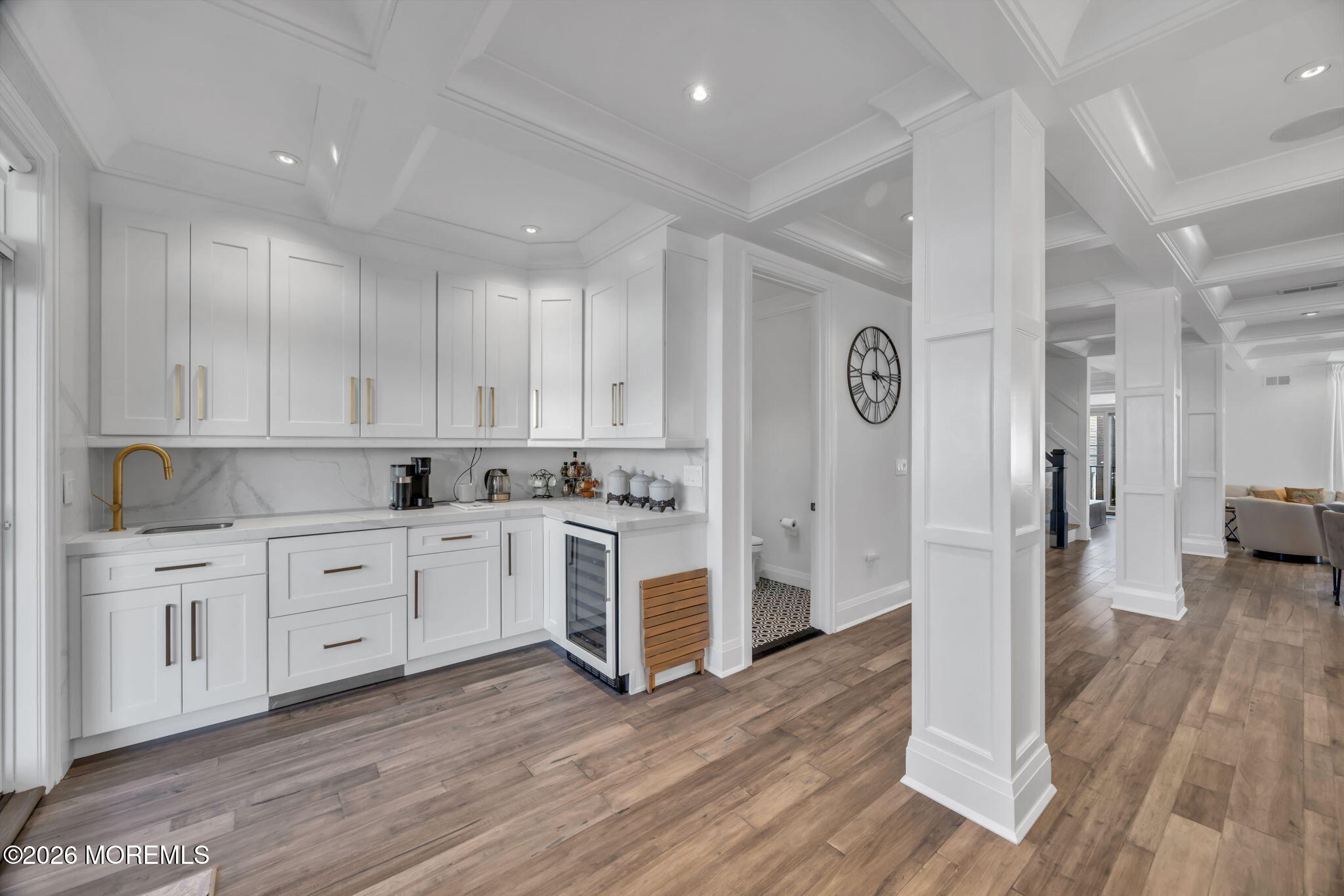 42 Marine Terrace Long Branch, NJ 07740 - Photo 10 of 36 a kitchen with white cabinets and stainless steel appliances