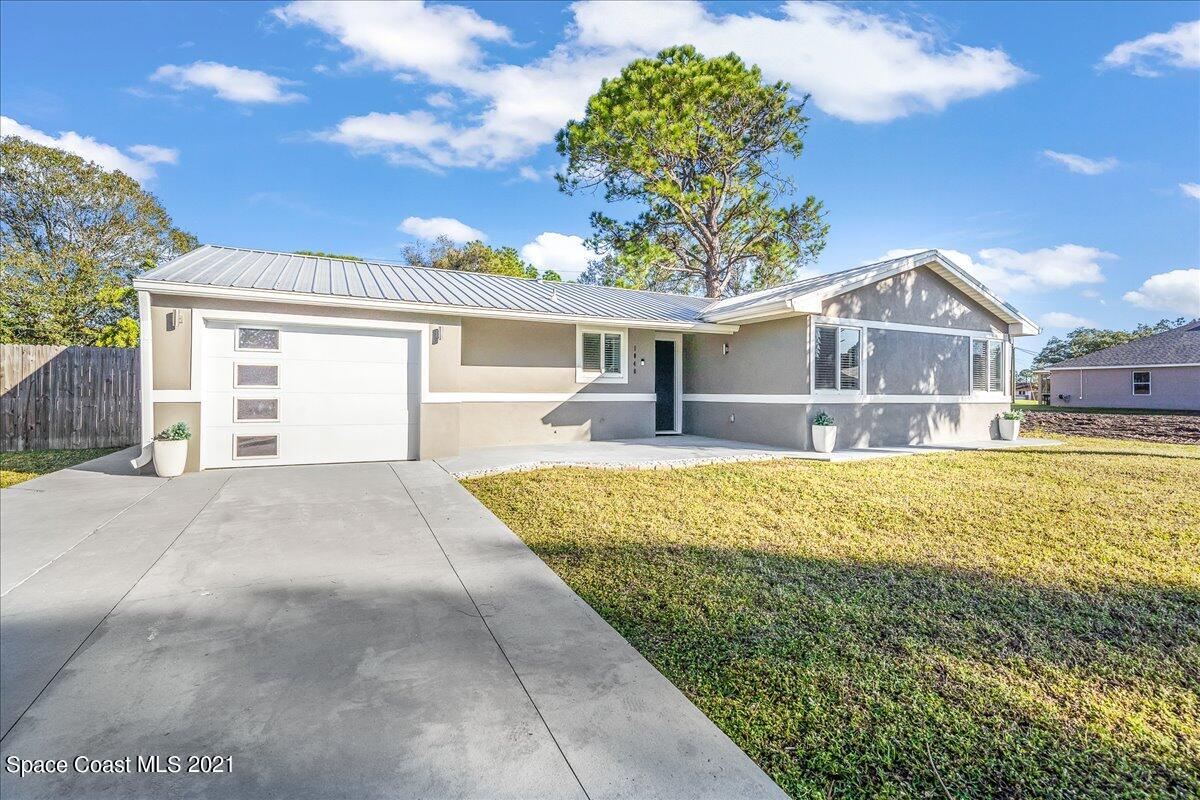 1040 Grapefruit Road Southeast Palm Bay, FL 32909 - Photo 1 of 32 01-untitled-32