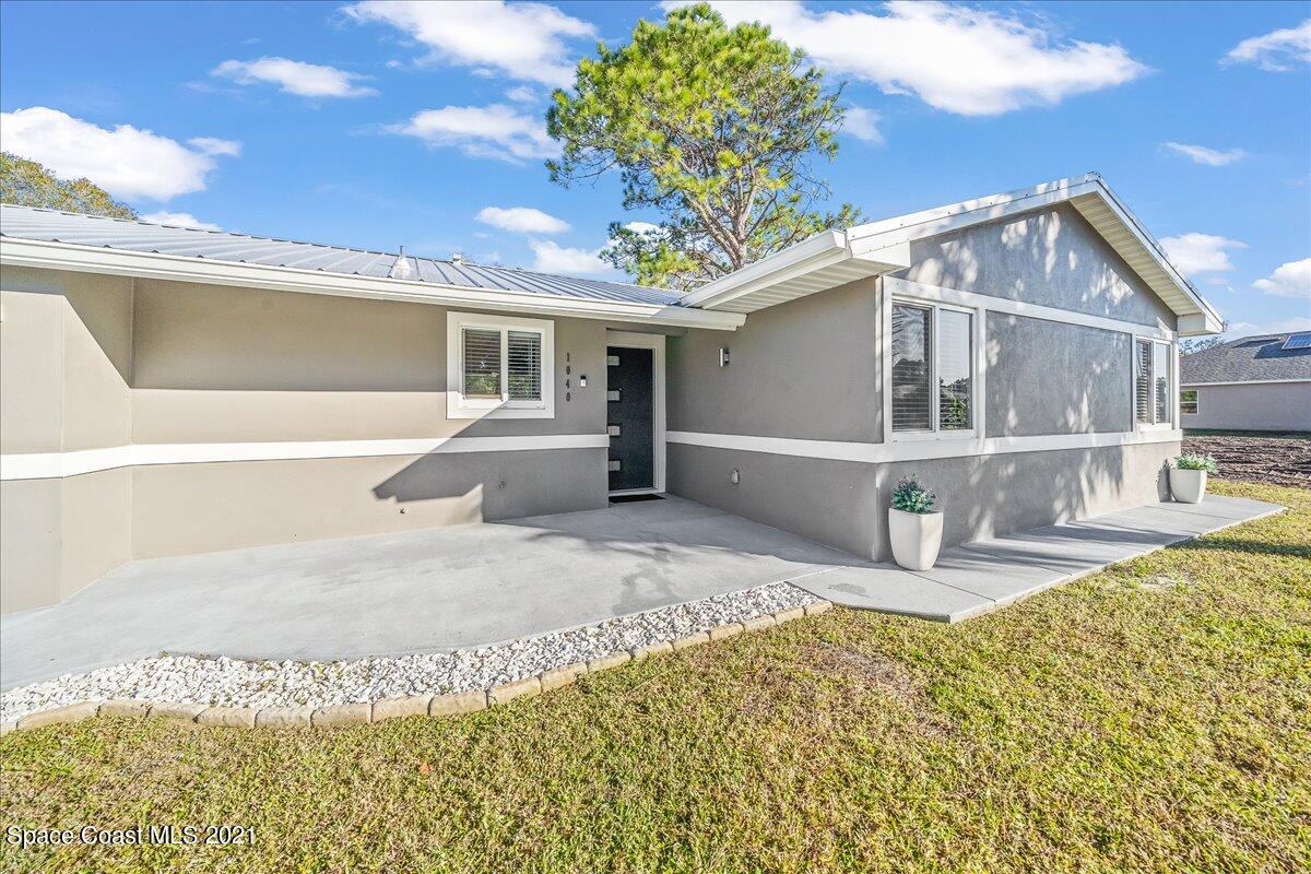 1040 Grapefruit Road Southeast Palm Bay, FL 32909 - Photo 2 of 32 04-untitled-34