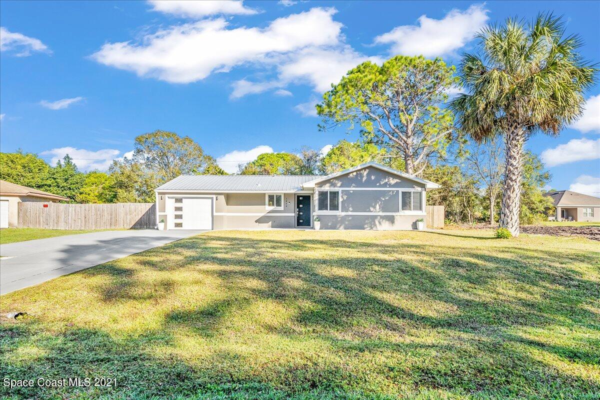 1040 Grapefruit Road Southeast Palm Bay, FL 32909 - Photo 3 of 32 02-untitled-35