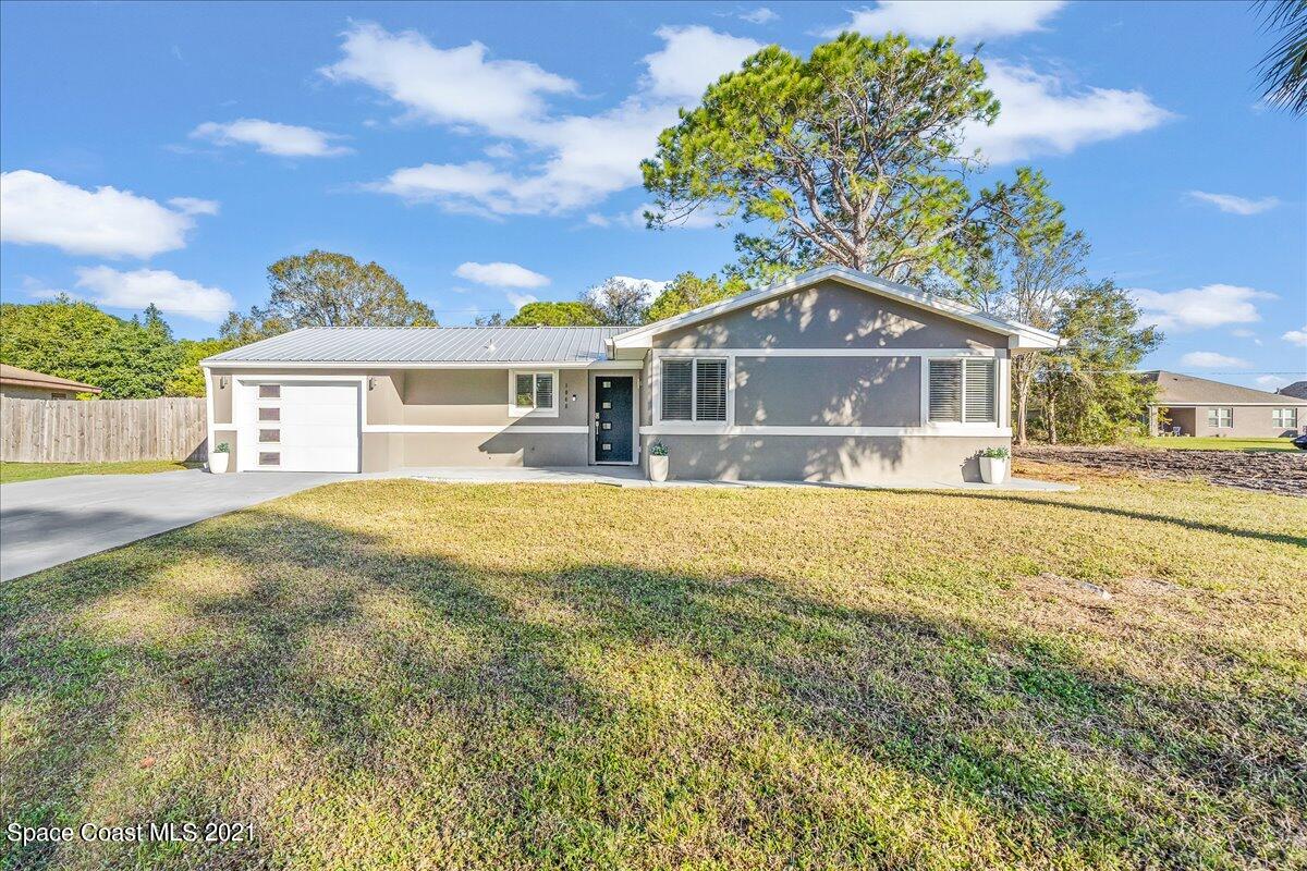 1040 Grapefruit Road Southeast Palm Bay, FL 32909 - Photo 4 of 32 03-untitled-33