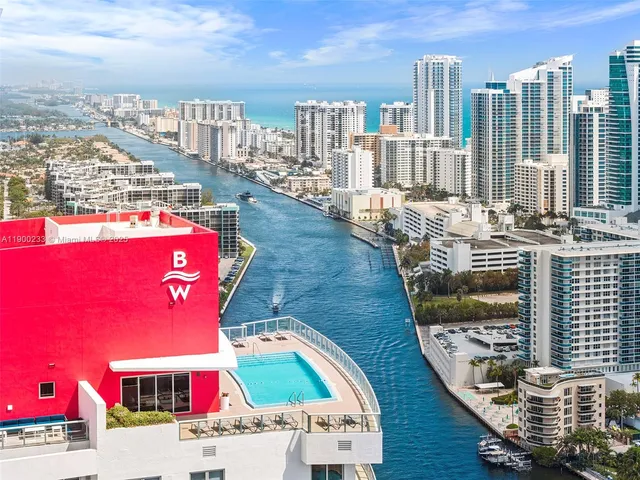 a view of a city with tall buildings