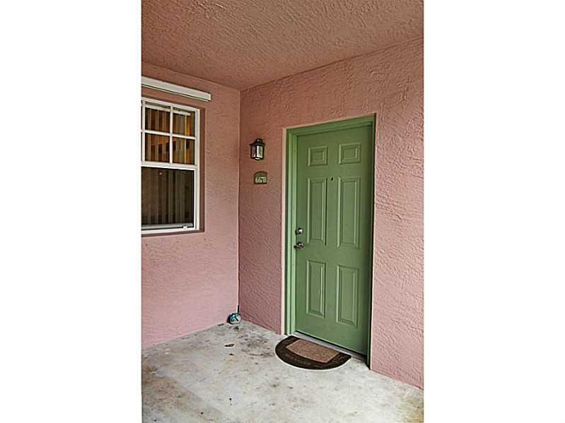 6678 West Sample Road, Unit B22 Coral Springs, FL 33067 - Photo 13 of 22 Exterior Front