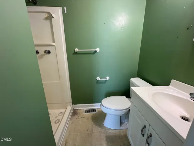 a bathroom with a sink and toilet