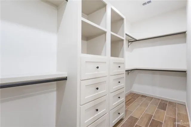 a view of an empty walk in closet