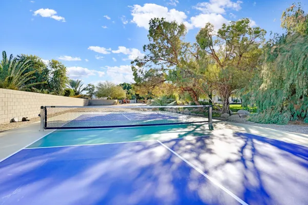 a kitchen with a sink stainless steel appliances and cabinets