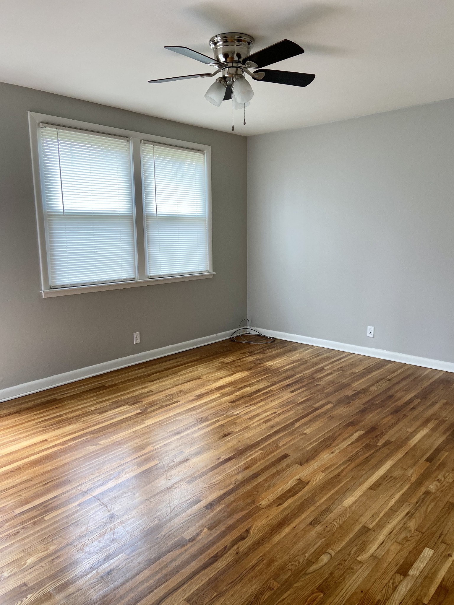 211 Pitt Lane Springfield, TN 37172 - Photo 6 of 18 wooden floor in an empty room with a window