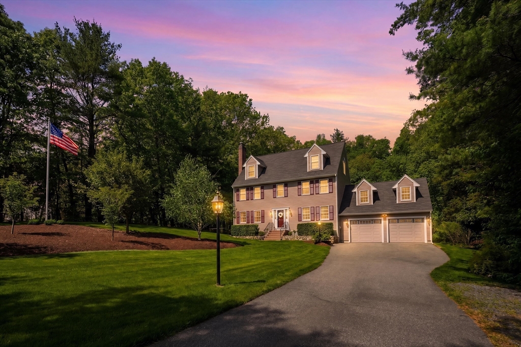 9 Fazio Farm Road Georgetown, MA 01833 - Photo 2 of 42 a front view of a house with a yard